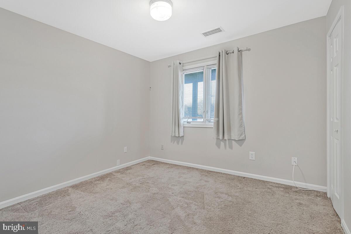 962 Main Street Deale, MD 20751 - Photo 30 of 54 an empty room with windows