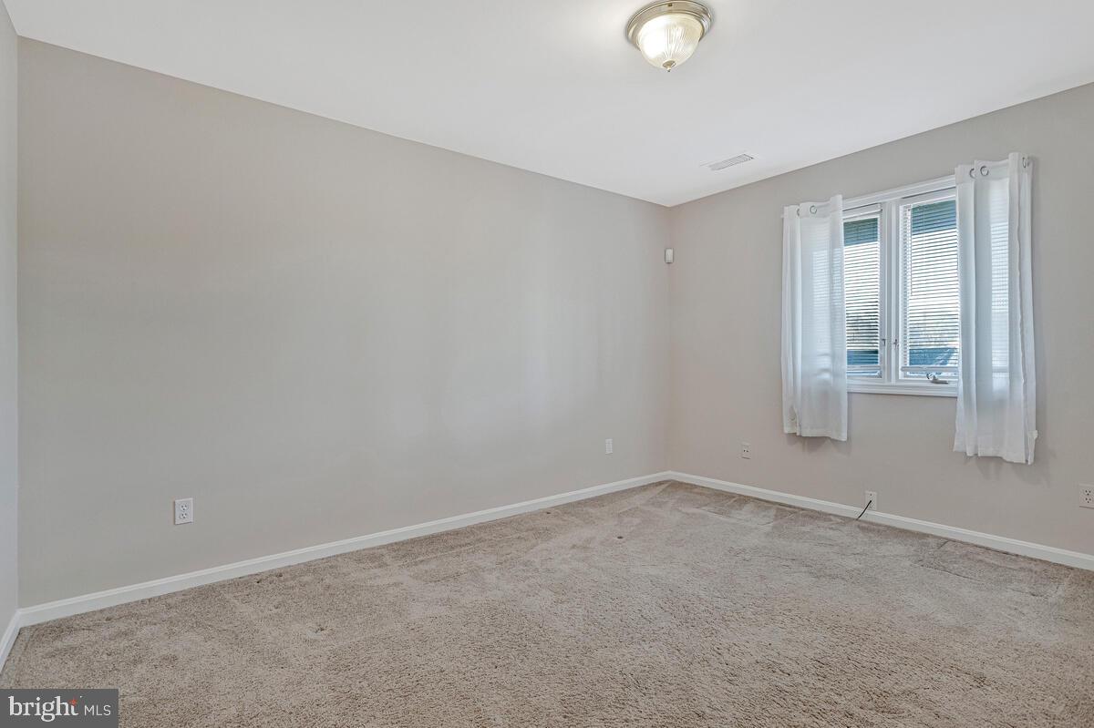 962 Main Street Deale, MD 20751 - Photo 33 of 54 an empty room with windows