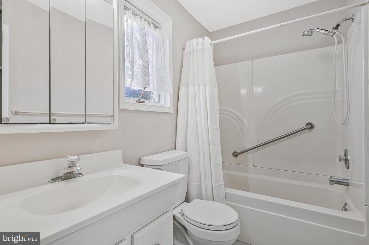 962 Main Street Deale, MD 20751 - Photo 34 of 54 a bathroom with a sink toilet and shower
