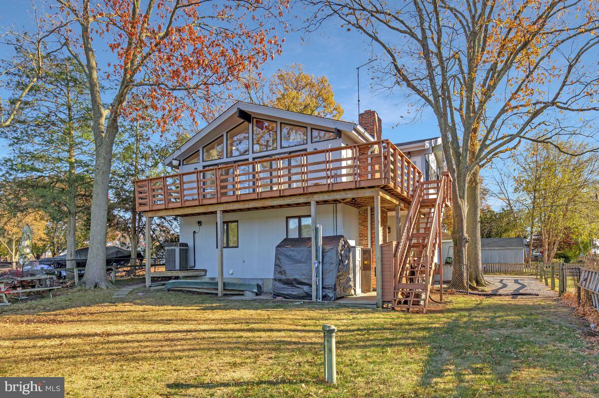 962 Main Street Deale, MD 20751 - Photo 40 of 54 a view of a house with pool and sitting area