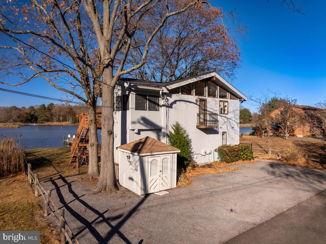 962 Main Street Deale, MD 20751 - Photo 41 of 54 a front view of a house with a yard