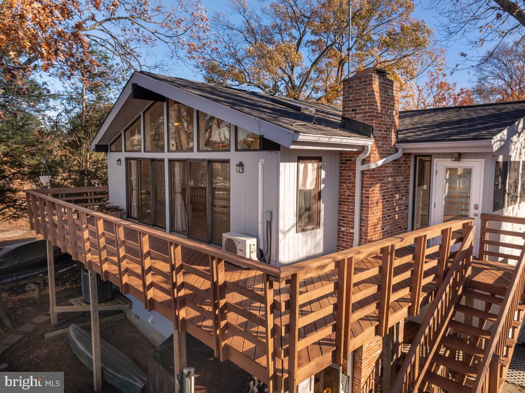 962 Main Street Deale, MD 20751 - Photo 43 of 54 a view of an house with wooden deck and balcony