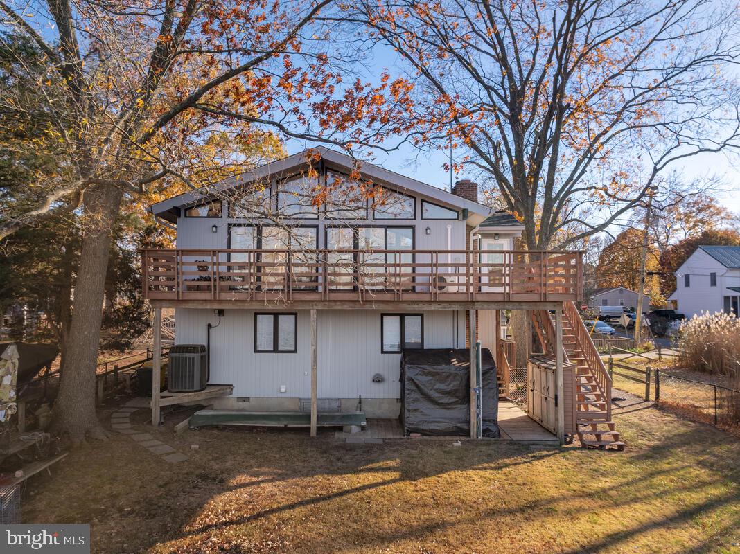 962 Main Street Deale, MD 20751 - Photo 45 of 54 a large tree in front of a white house
