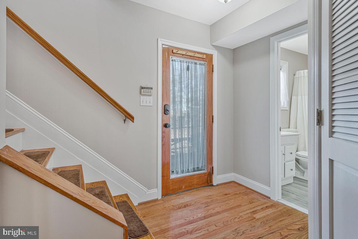 962 Main Street Deale, MD 20751 - Photo 5 of 54 a view of entryway with stairs