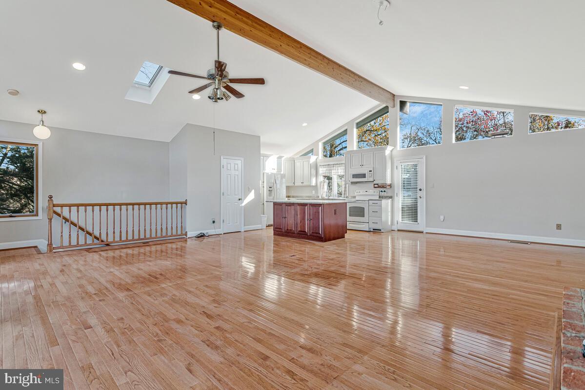 962 Main Street Deale, MD 20751 - Photo 7 of 54 a view of kitchen and hall with wooden floor