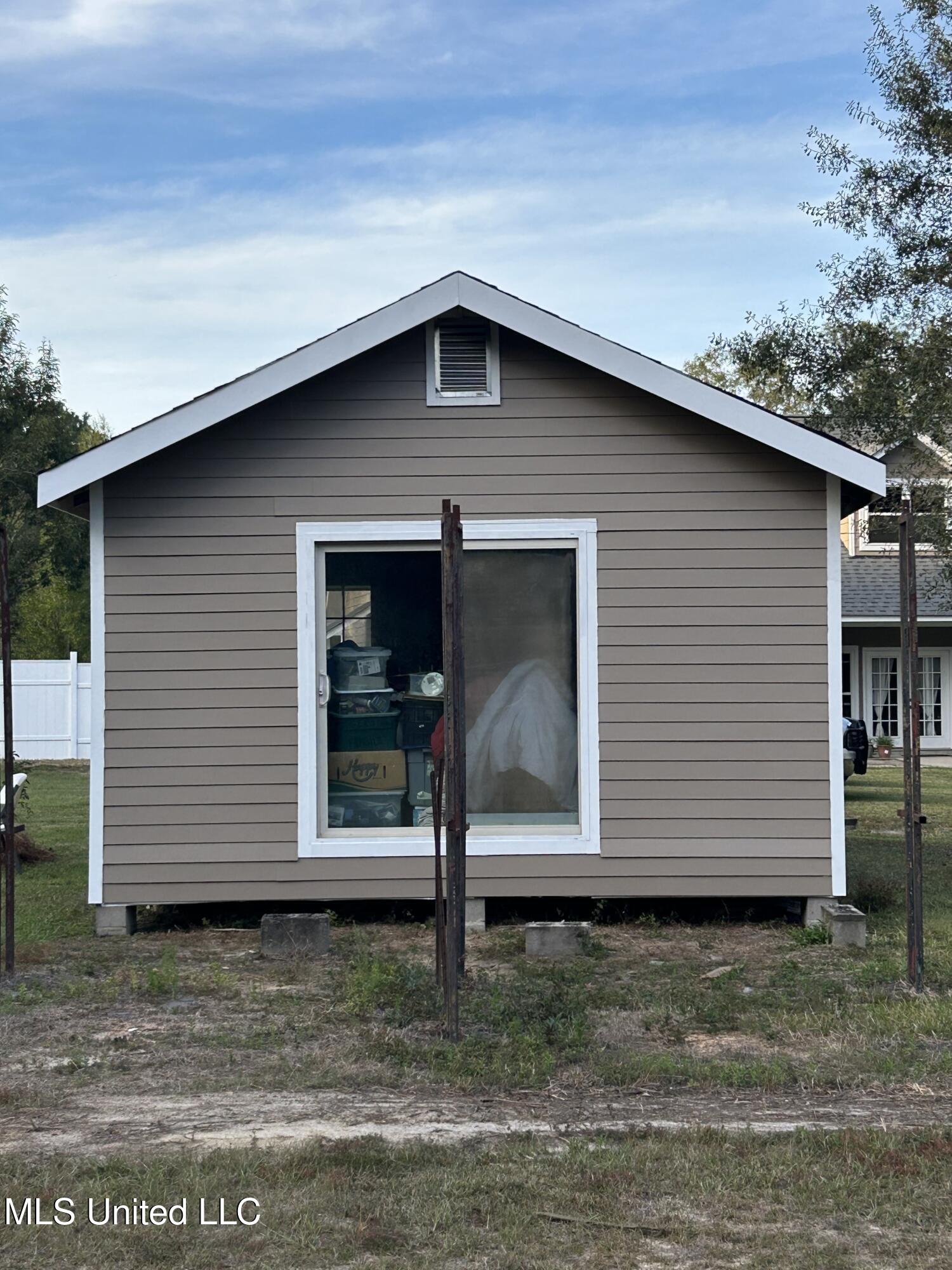 22473 Yankee Town Road Saucier, MS 39574 - Photo 58 of 67 Cottage Storage Building2
