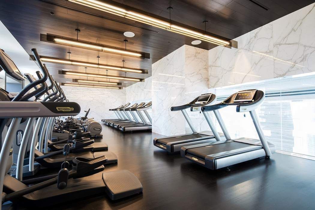 157 West 57th Street, Unit 35E Manhattan, NY 10019 - Photo 9 of 12 a view of a room with gym equipment