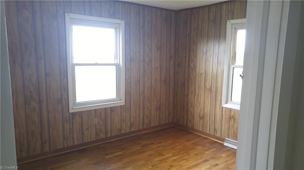 262 Stone Road Reidsville, NC 27320 - Photo 5 of 8 Additional Bedroom. Wood Floors and a closet.