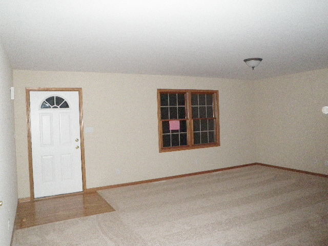 4780 East Grinter Road Gardner, IL 60424 - Photo 4 of 12 an empty room with windows