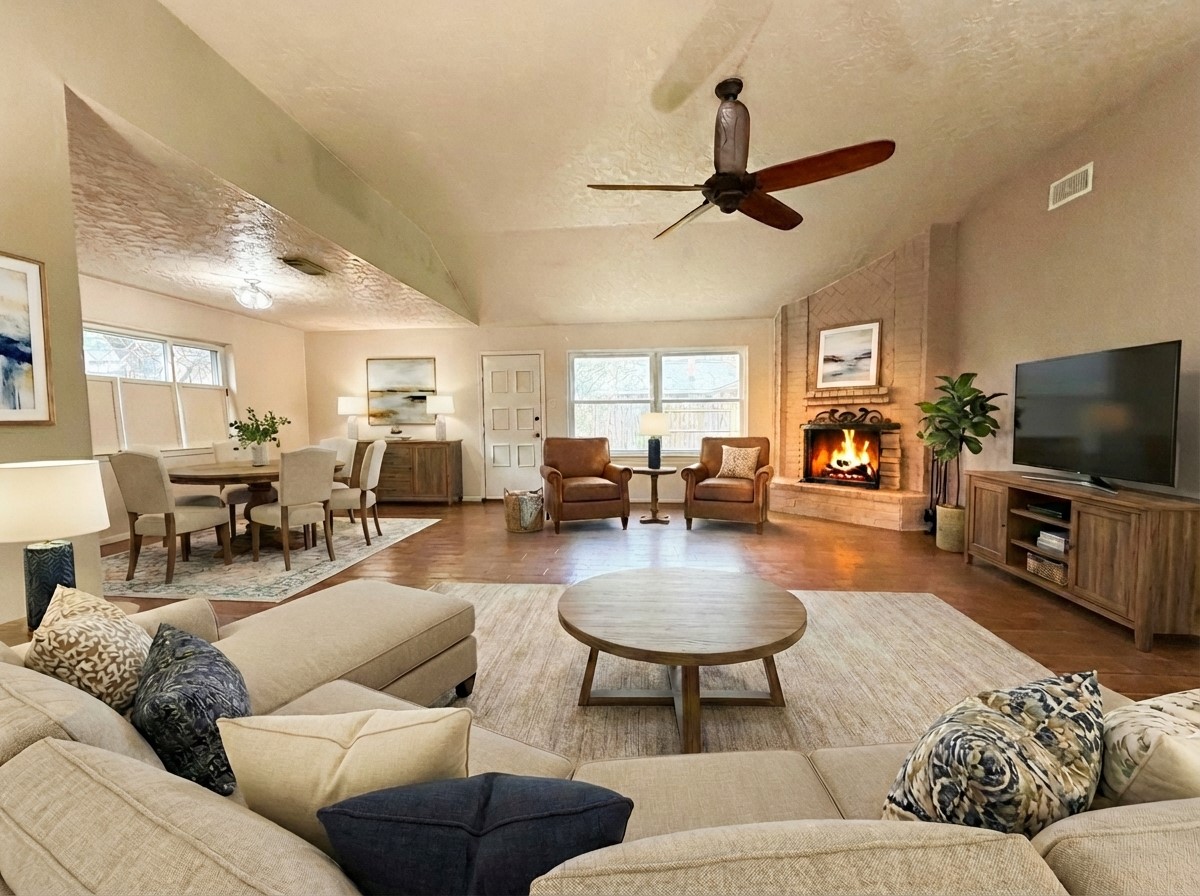 4831 Diehlwood Place Spring, TX 77388 - Photo 4 of 12 a living room with furniture and a flat screen tv