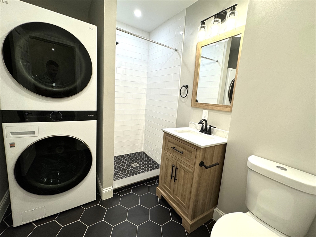 11 East Milton Road, Unit 1 Brookline, MA 02445 - Photo 19 of 24 a bathroom with a sink and a toilet