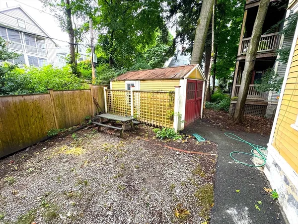 a view of backyard with green space