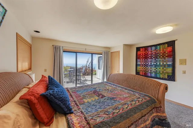 a view of a kitchen with a sink and dishwasher
