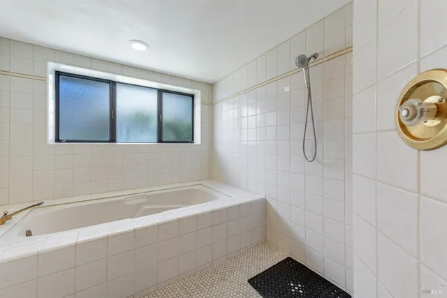 a view of a golf course with a lake