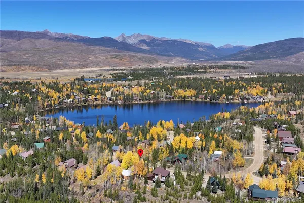 a view of a city with mountains in the background