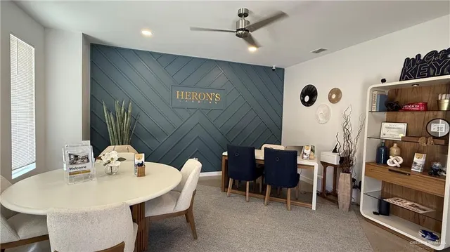 a media room with lots of chairs and a projector screen