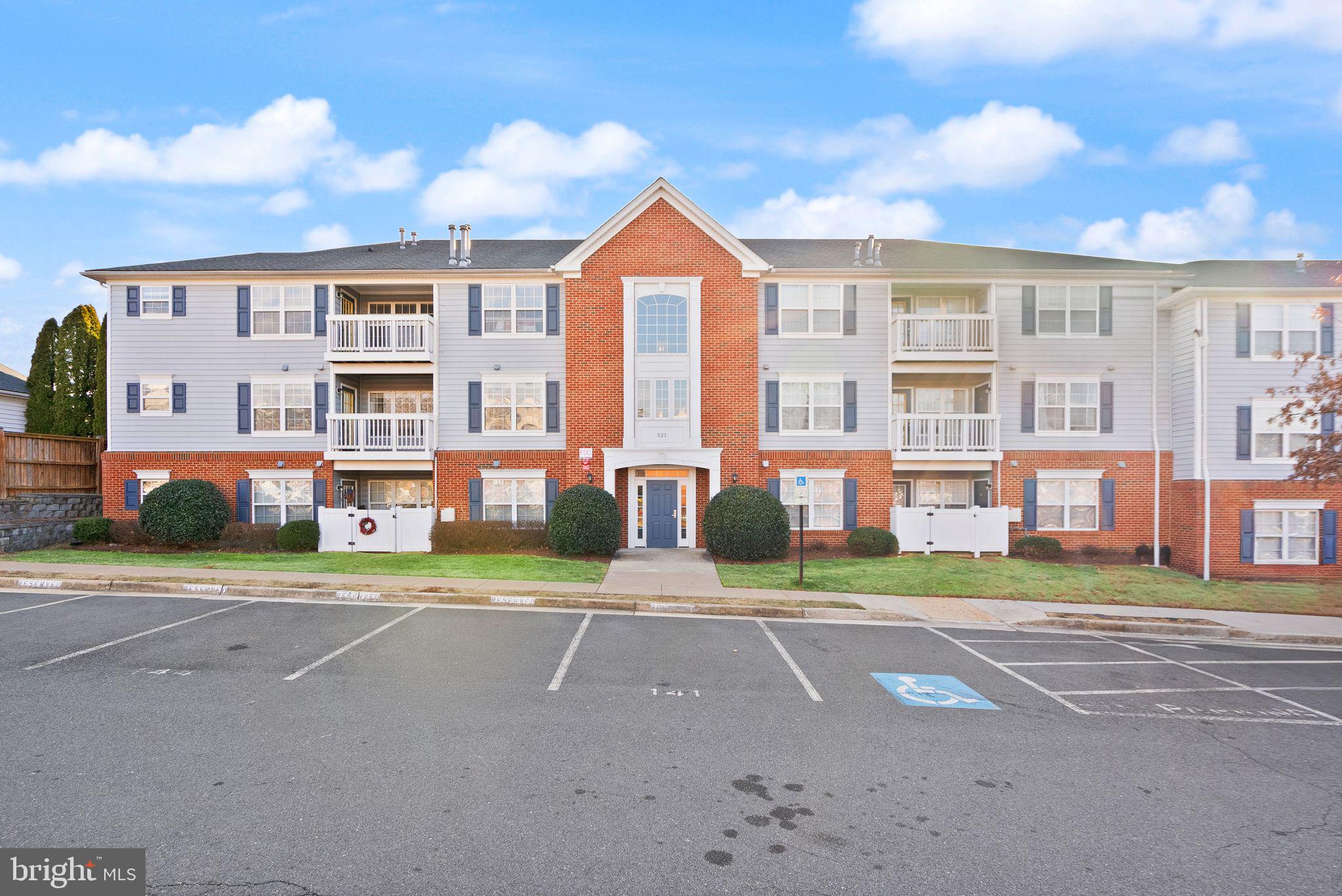 521 Constellation Square Southeast, Unit E Leesburg, VA 20175 - Photo 24 of 27 a front view of building with street