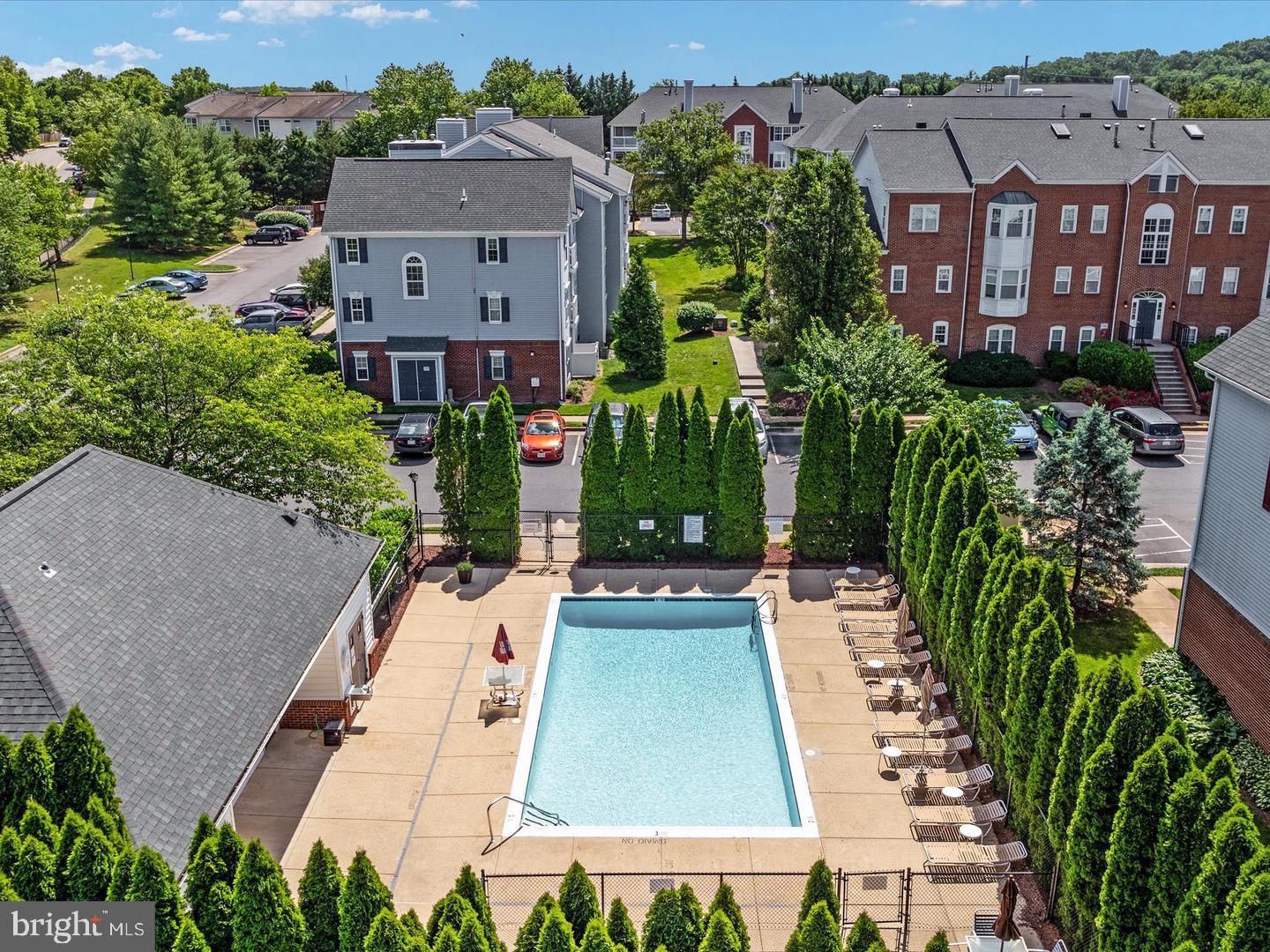 521 Constellation Square Southeast, Unit E Leesburg, VA 20175 - Photo 27 of 27 an aerial view of multiple houses with a yard