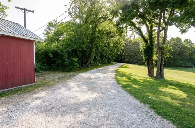 a view of swimming pool with a backyard