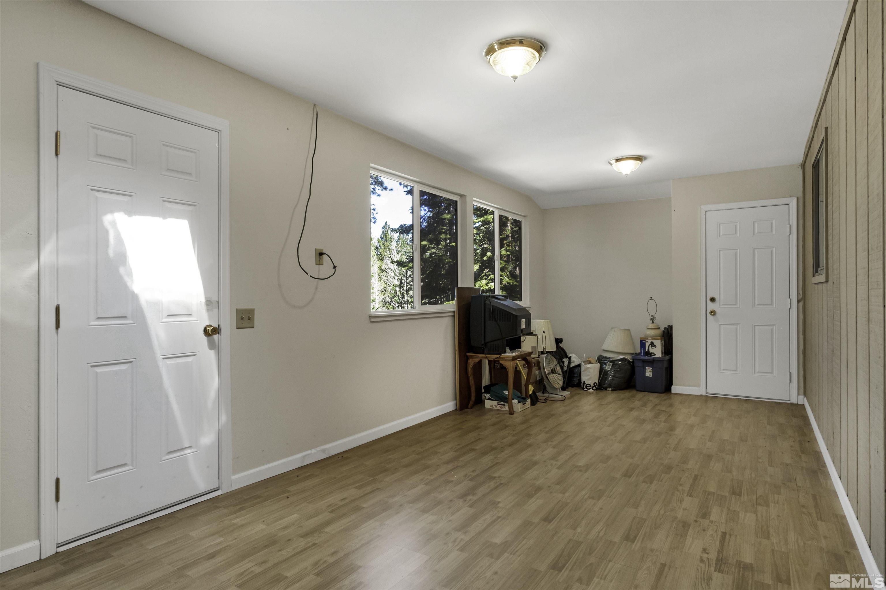 174 Juniper Drive Stateline, NV 89449 - Photo 16 of 32 wooden floor in a hall with an entryway