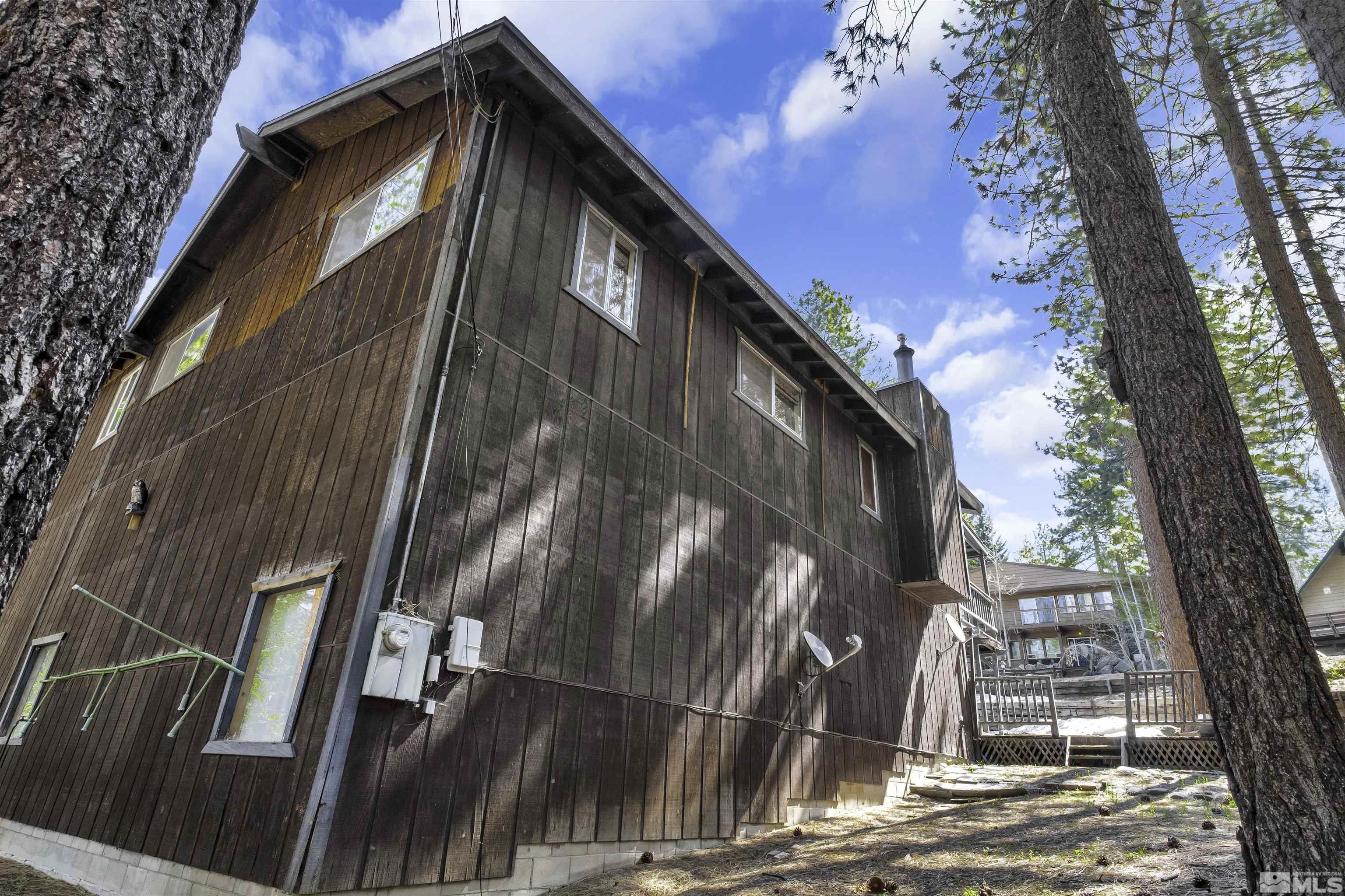 174 Juniper Drive Stateline, NV 89449 - Photo 31 of 32 a view of a house with a tree