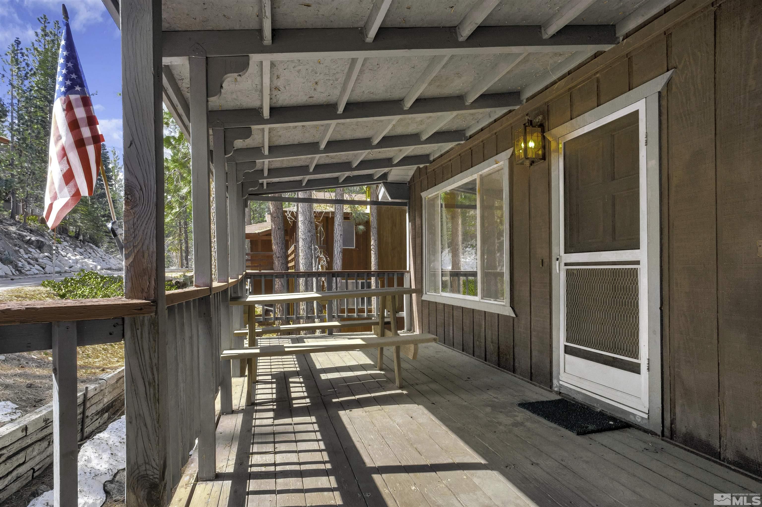 174 Juniper Drive Stateline, NV 89449 - Photo 4 of 32 a view of balcony with wooden floor and door
