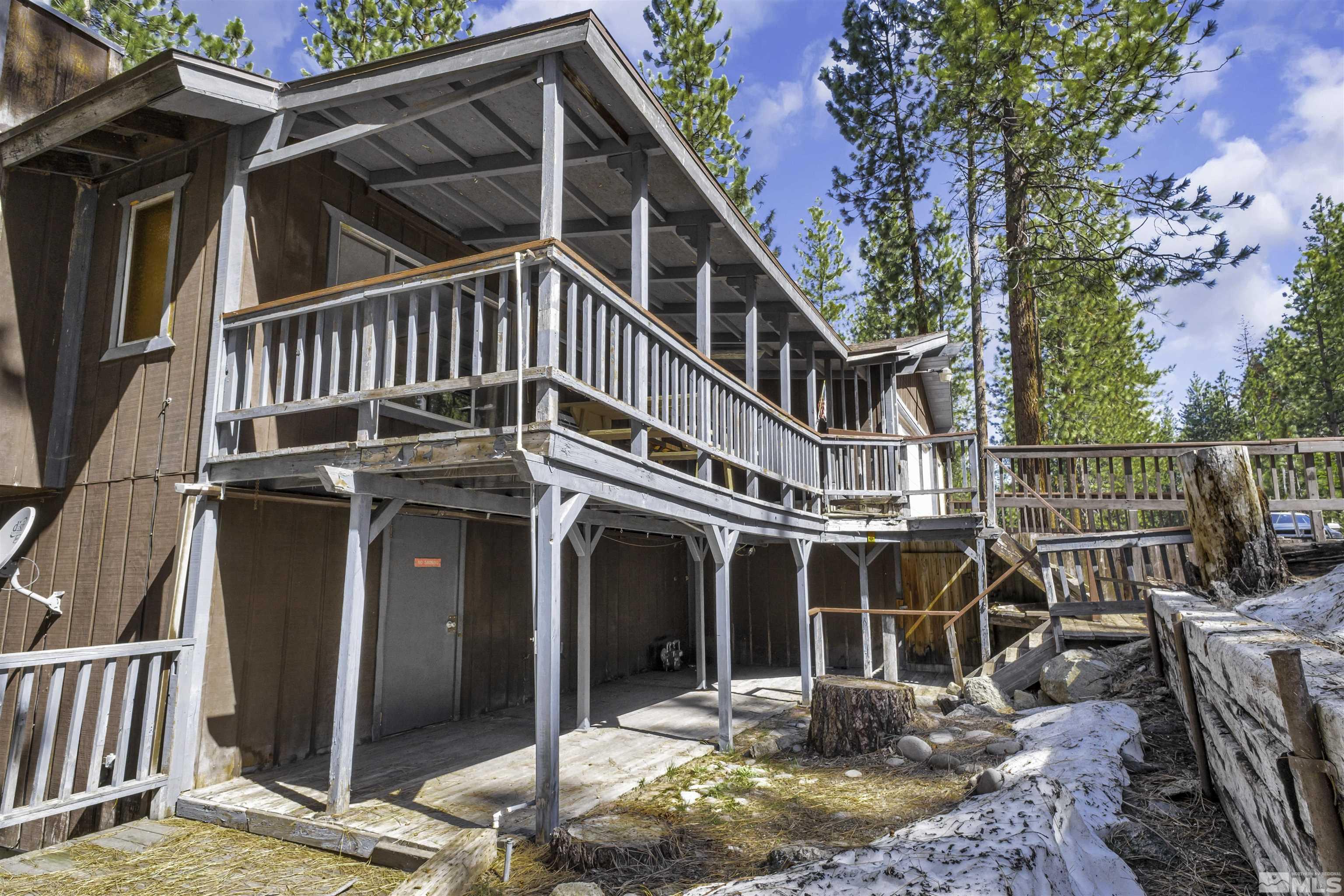 174 Juniper Drive Stateline, NV 89449 - Photo 5 of 32 a view of a house with backyard porch and sitting area