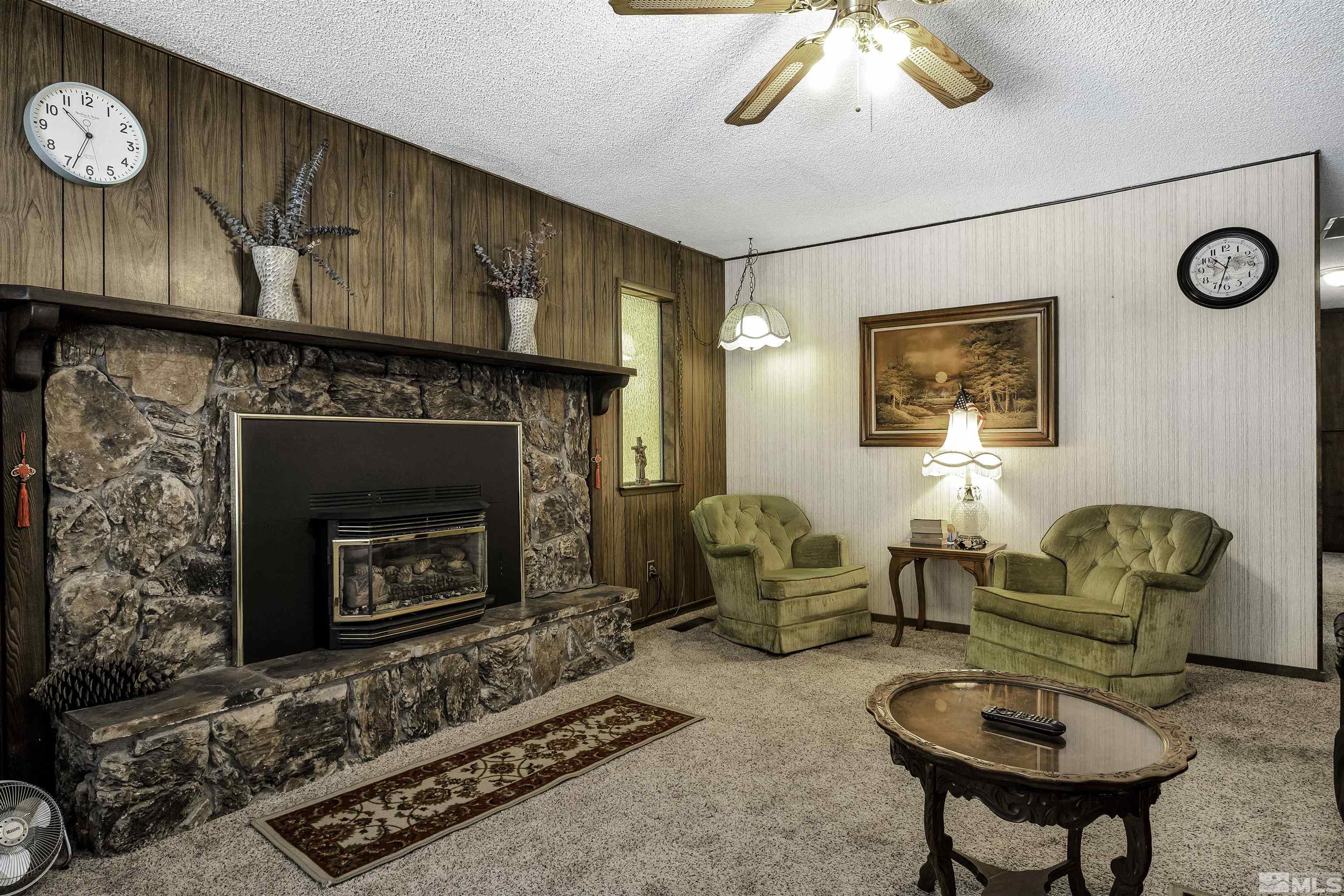 174 Juniper Drive Stateline, NV 89449 - Photo 7 of 32 a living room with furniture and a fireplace