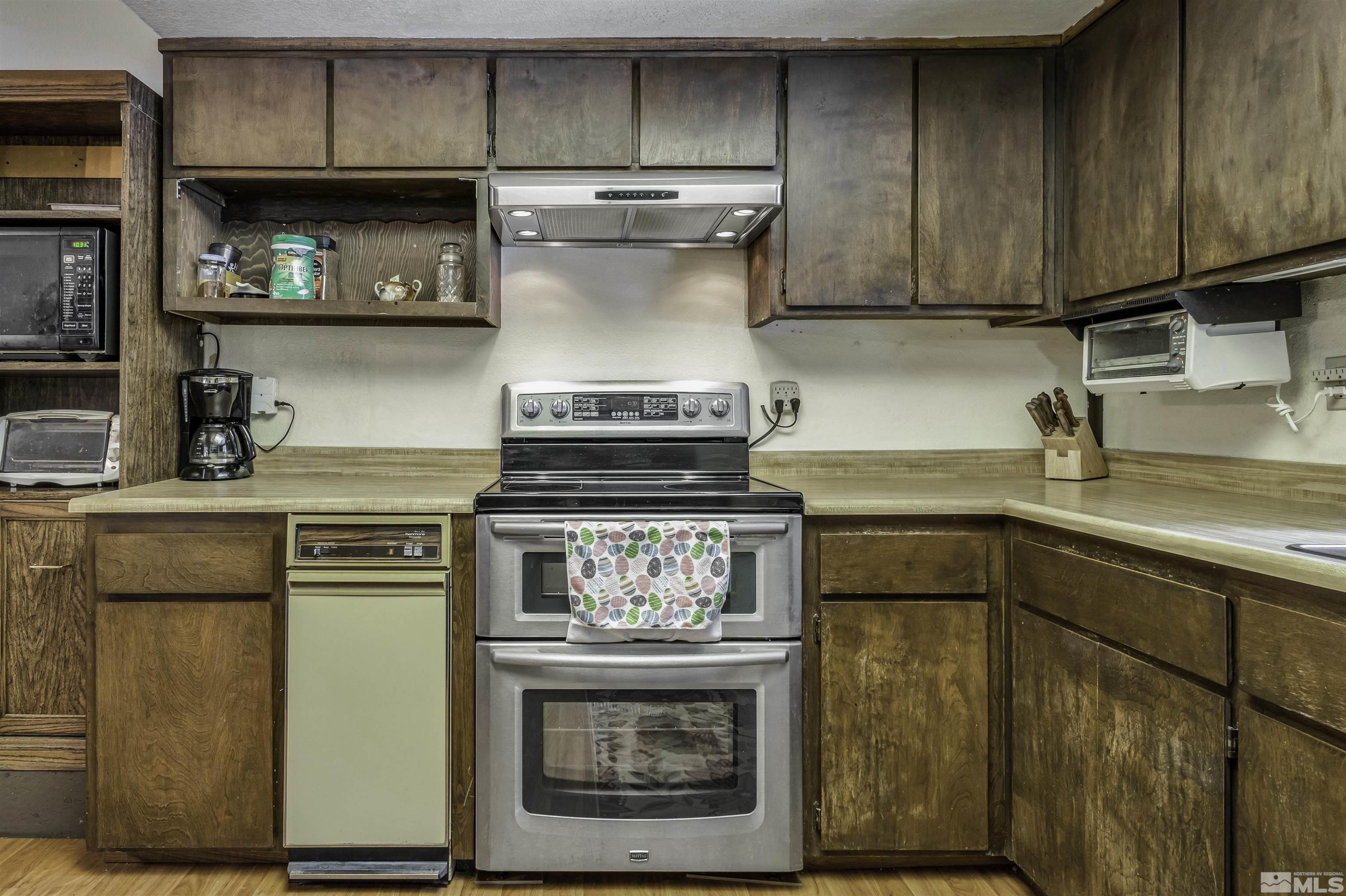 174 Juniper Drive Stateline, NV 89449 - Photo 10 of 32 a kitchen with appliances cabinets and a sink