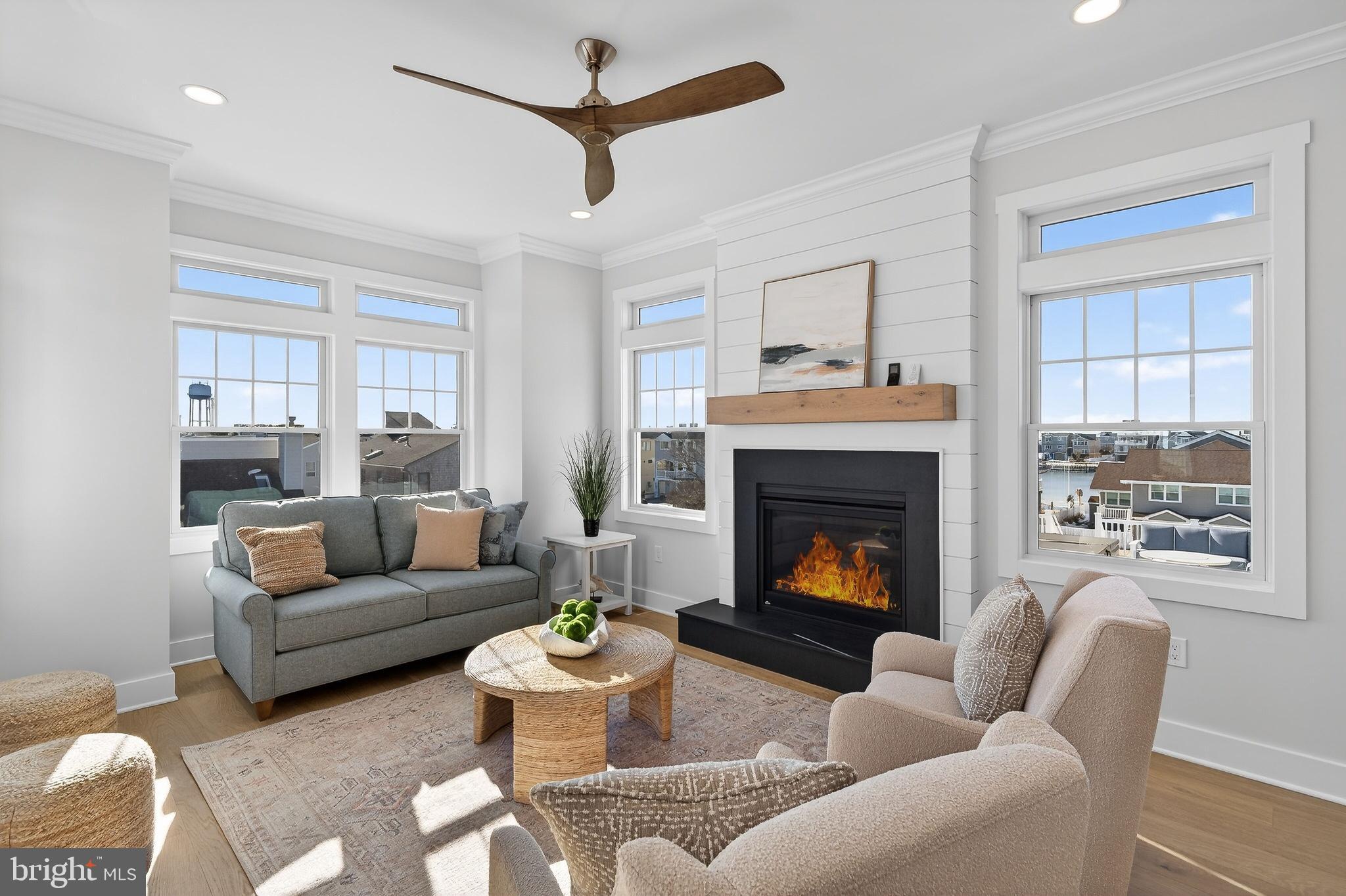 7 Cohasset Road Long Beach Township, NJ 08008 - Photo 15 of 74 Gas fireplace with black granite and custom mantel