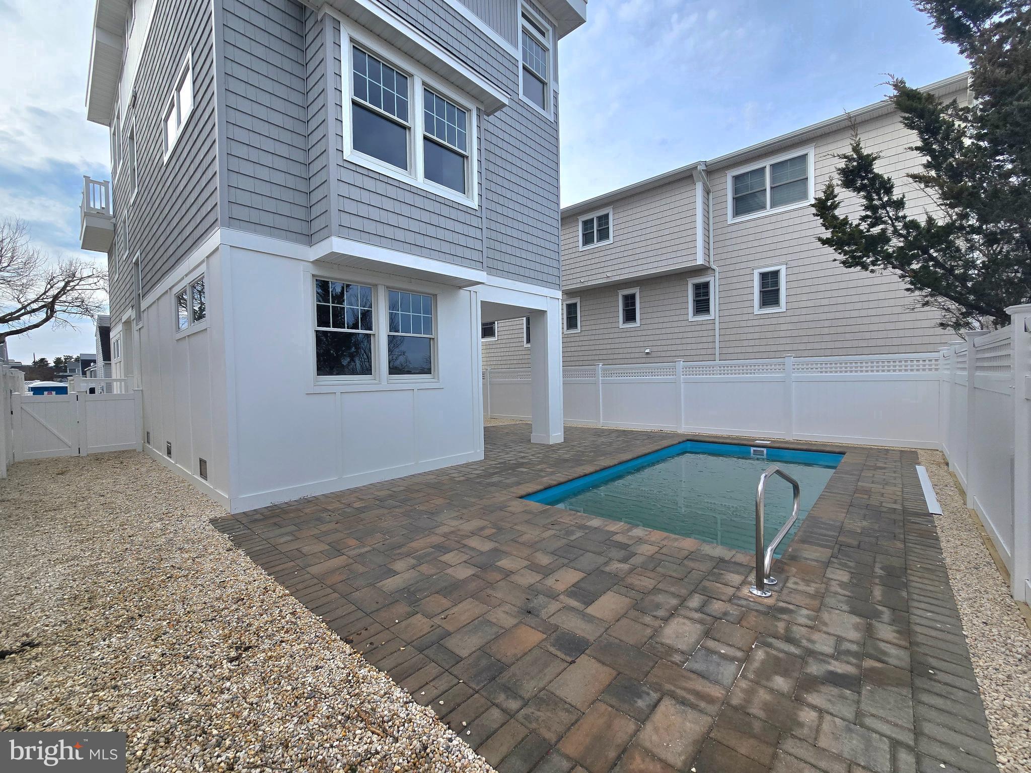 7 Cohasset Road Long Beach Township, NJ 08008 - Photo 3 of 74 Heated, salt water swimming pool