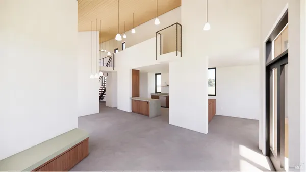 a view of a big room with closet and windows