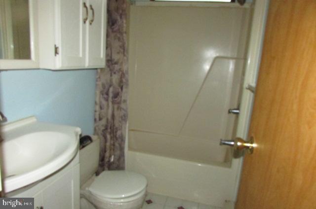104 Butchershop Road Duncannon, PA 17020 - Photo 17 of 22 a bathroom with a sink a toilet and shower