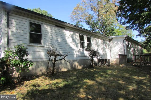 104 Butchershop Road Duncannon, PA 17020 - Photo 4 of 22 a backyard of a house with table and chairs