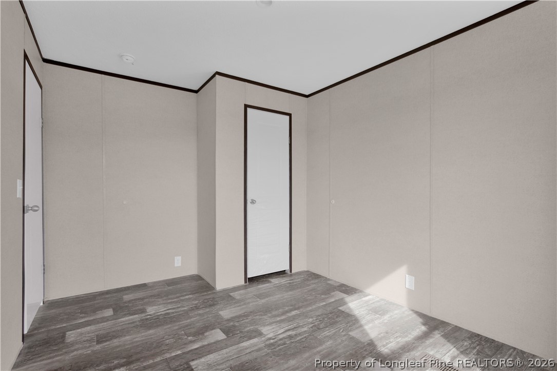 6309 Deep Branch Road Pembroke, NC 28372 - Photo 22 of 32 a view of a room with wooden floor
