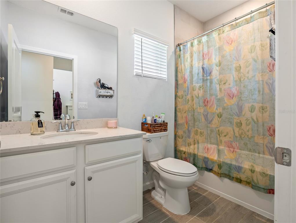 7580 Southwest 78th Terrace Ocala, FL 34481 - Photo 18 of 48 a bathroom with a toilet sink and shower