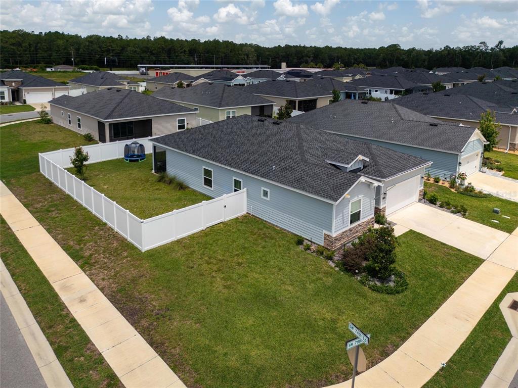 7580 Southwest 78th Terrace Ocala, FL 34481 - Photo 37 of 48 a view of a house with pool and a yard