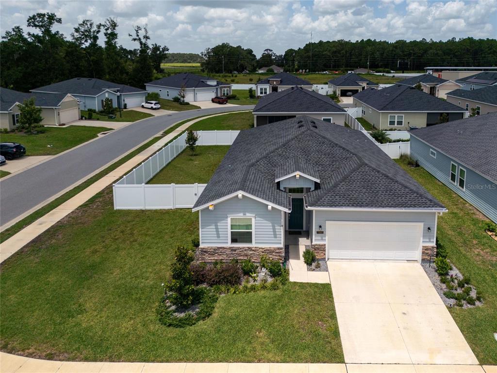 7580 Southwest 78th Terrace Ocala, FL 34481 - Photo 4 of 48 a aerial view of a house with a garden