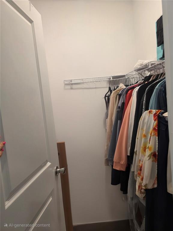 7580 Southwest 78th Terrace Ocala, FL 34481 - Photo 48 of 48 a view of walk in closet with clothes and shoes