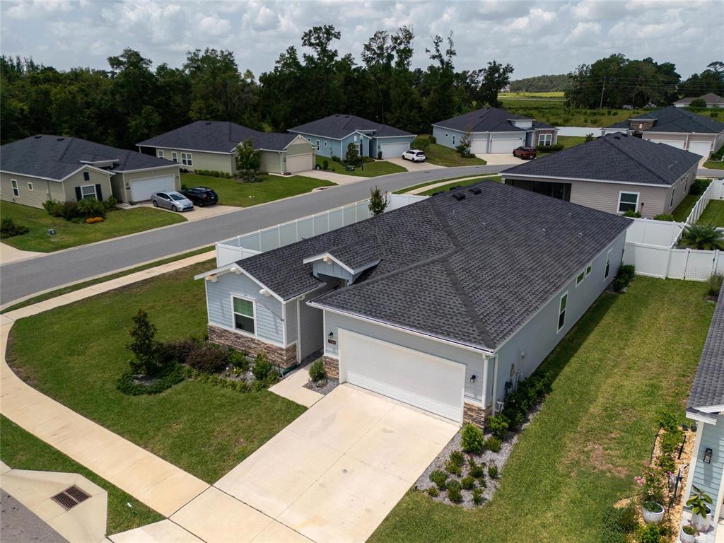 7580 Southwest 78th Terrace Ocala, FL 34481 - Photo 5 of 48 a aerial view of a house with garden space and street view