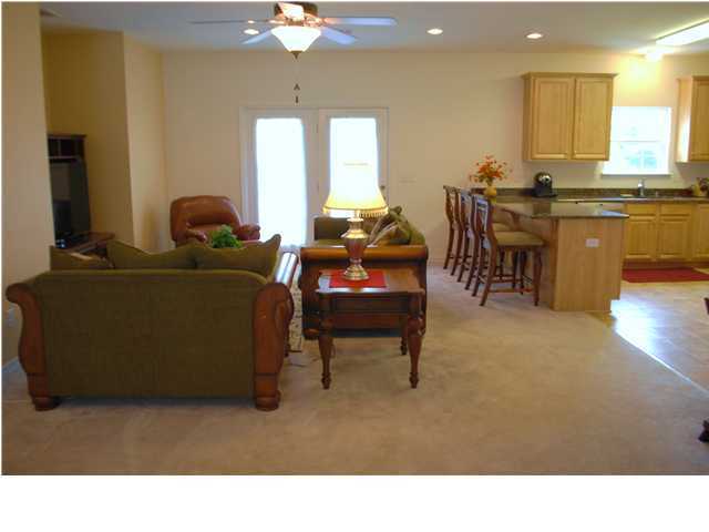 54 Maple Street Santa Rosa Beach, FL 32459 - Photo 3 of 9 a living room with furniture and a large window