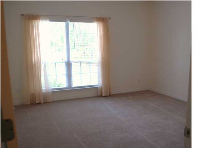 54 Maple Street Santa Rosa Beach, FL 32459 - Photo 6 of 9 an empty room with a window