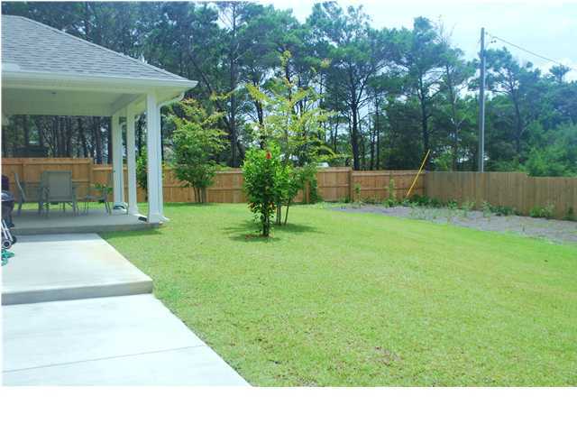 54 Maple Street Santa Rosa Beach, FL 32459 - Photo 9 of 9 a view of backyard with green space