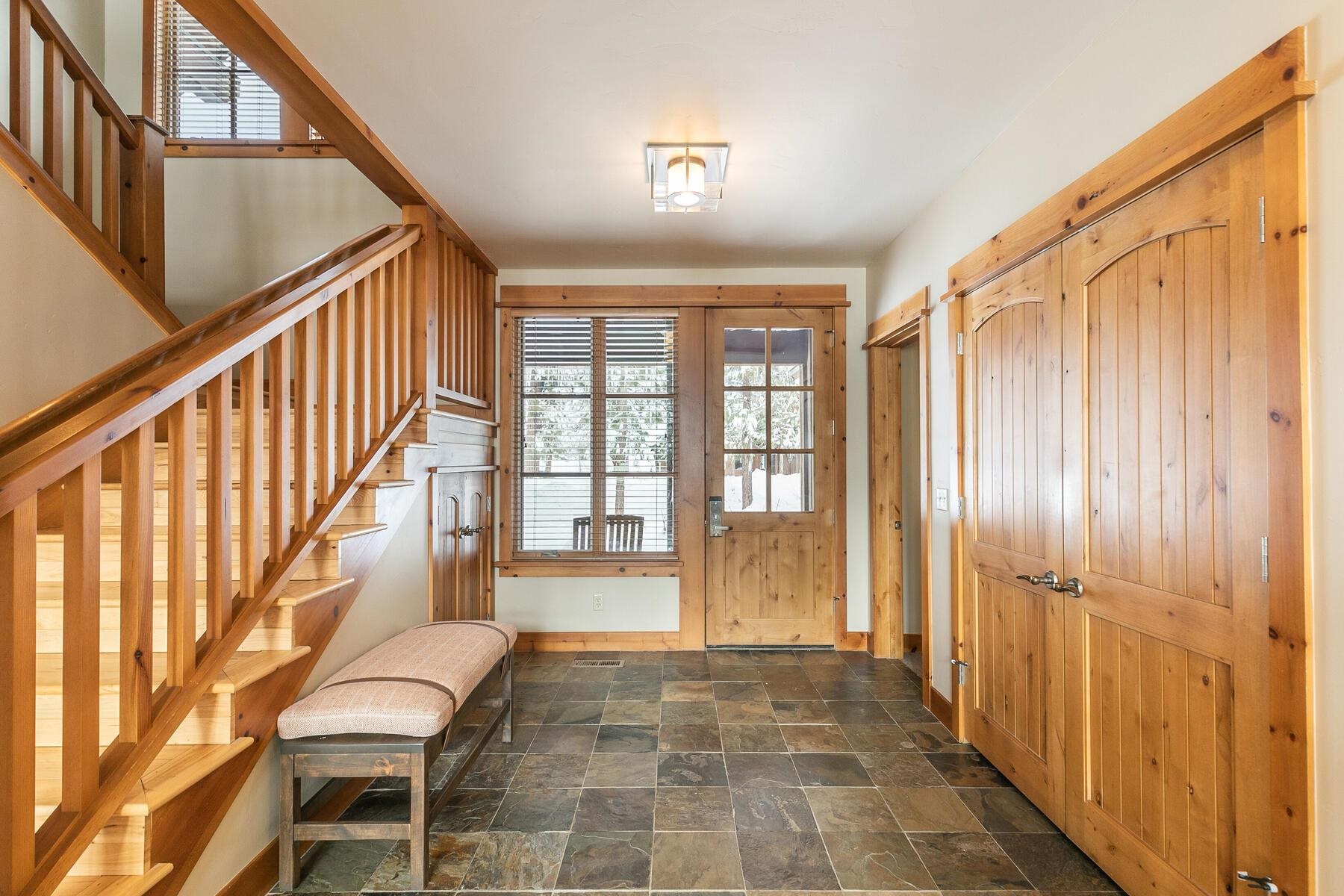 12247 Lookout Loop, Unit F603 Truckee, CA 96161 - Photo 13 of 28 a view of an entryway with wooden floor and door