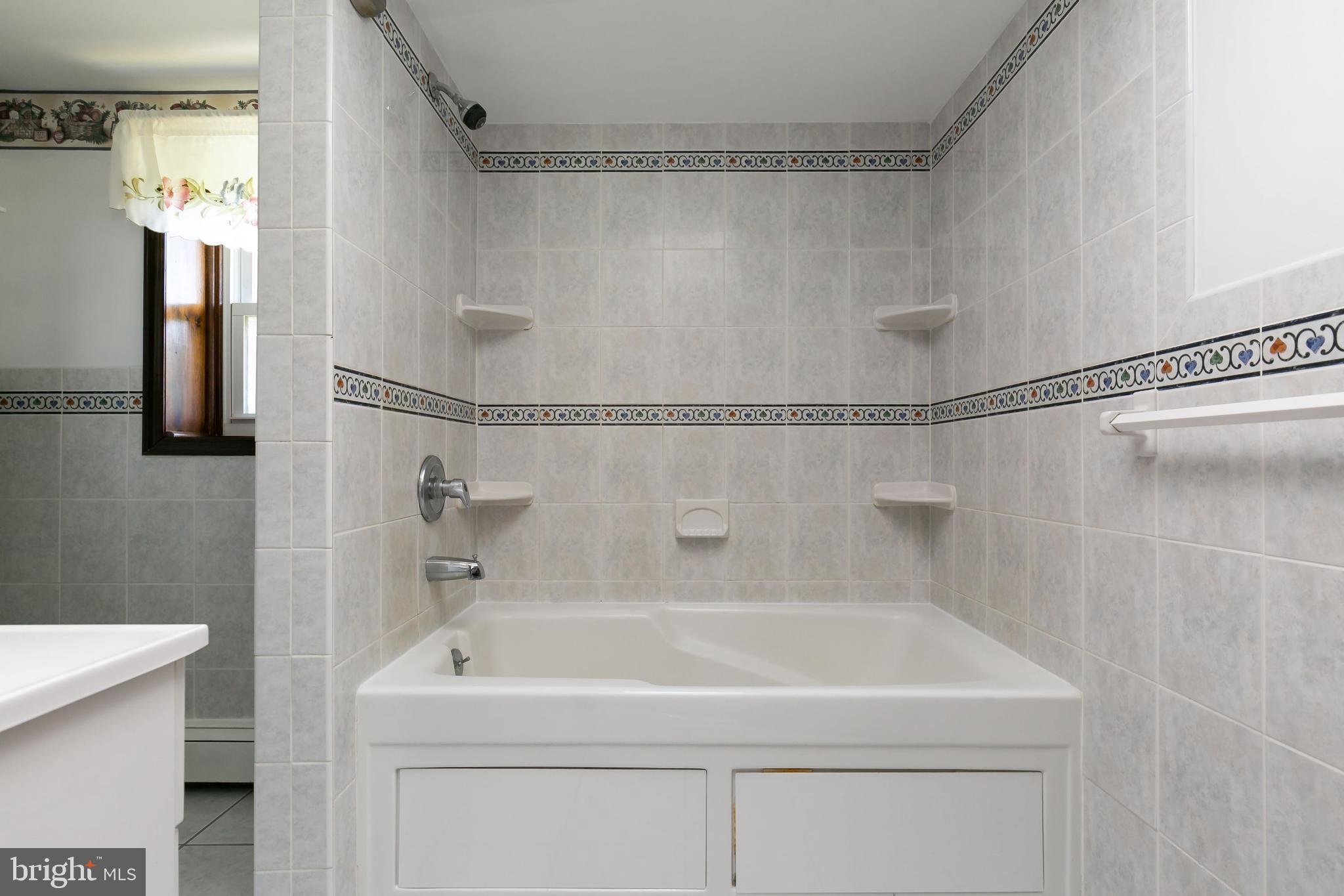 86 Hopkins Road New Egypt, NJ 08533 - Photo 15 of 37 a bathroom with a shower and a sink