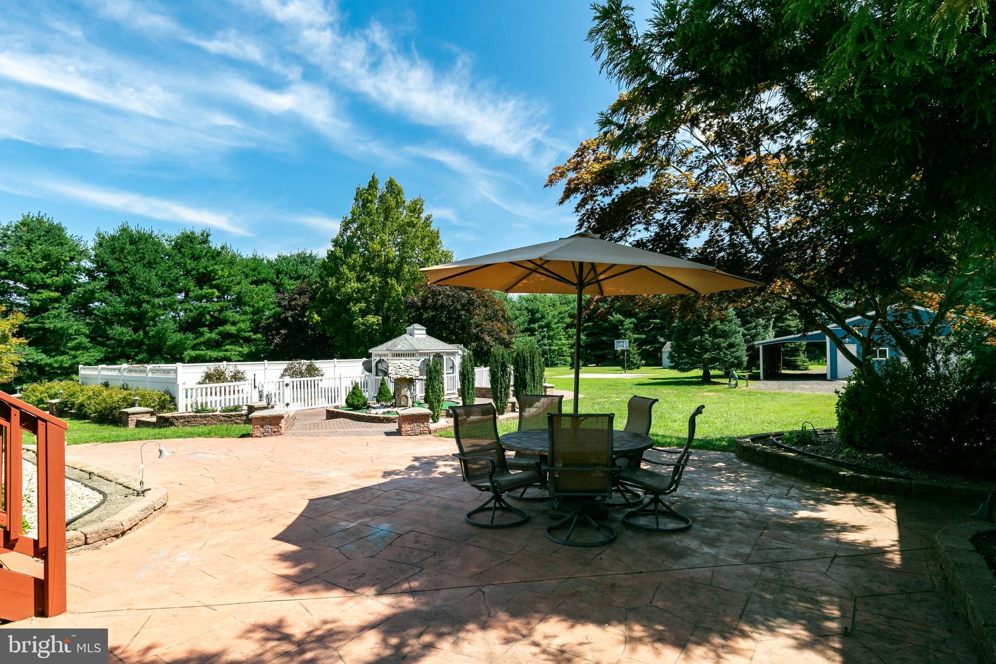 86 Hopkins Road New Egypt, NJ 08533 - Photo 27 of 37 a view of outdoor space yard deck patio and outdoor kitchen