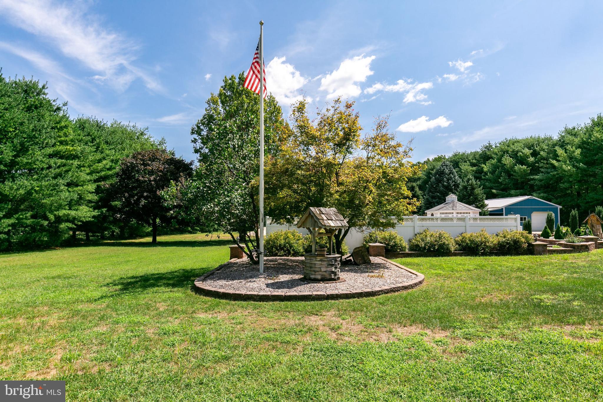 86 Hopkins Road New Egypt, NJ 08533 - Photo 28 of 37 a view of a garden with a fountain