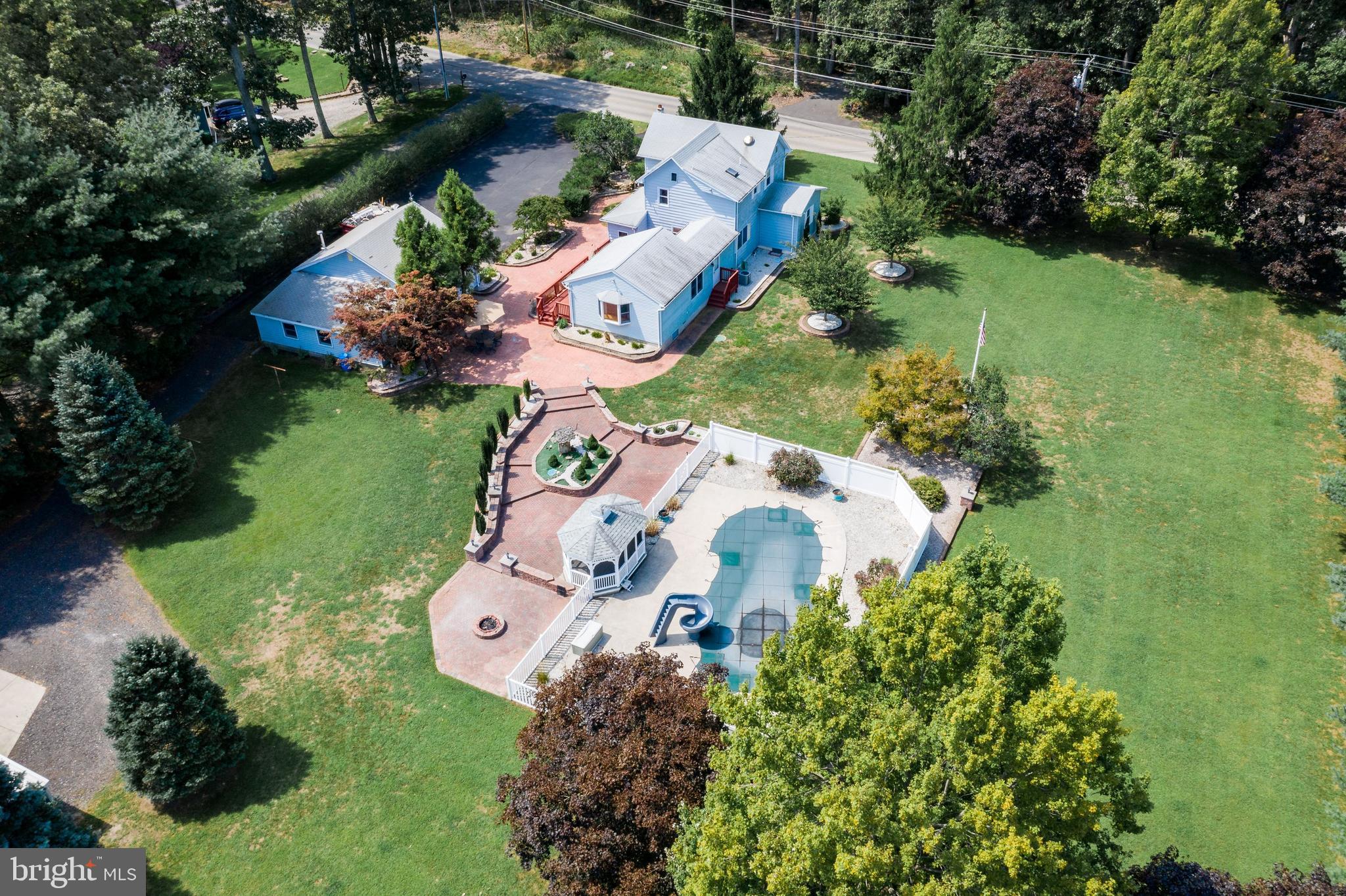 86 Hopkins Road New Egypt, NJ 08533 - Photo 35 of 37 an aerial view of a house with a garden