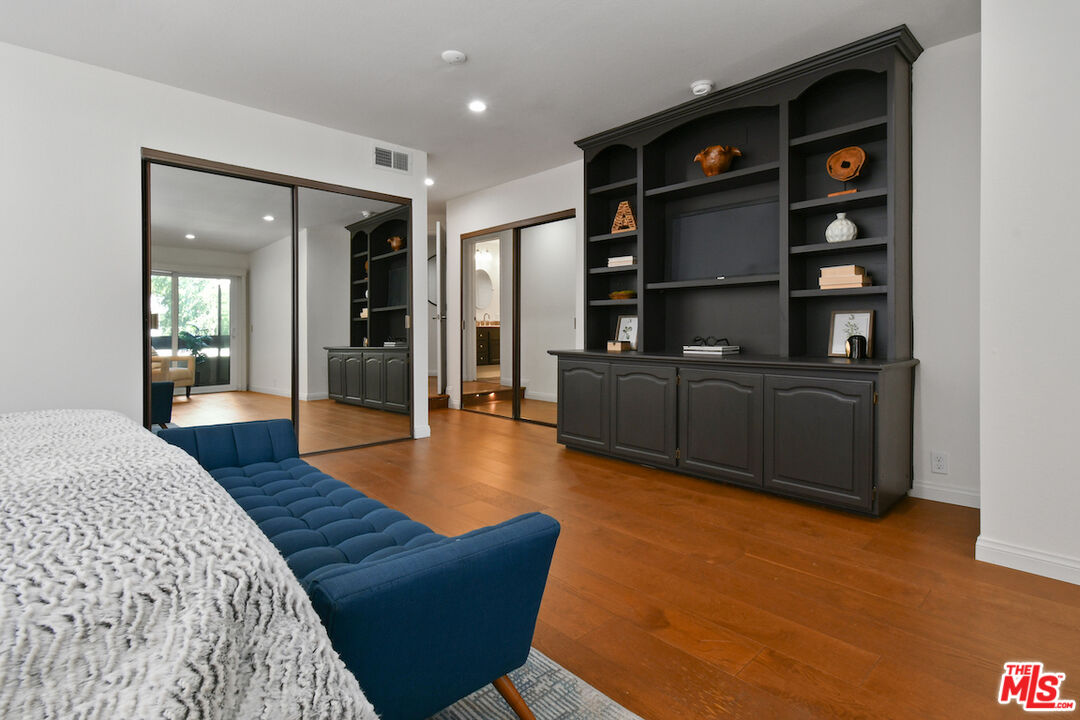 10409 Riverside Drive, Unit 204 Toluca Lake, CA 91602 - Photo 22 of 36 a living room with furniture