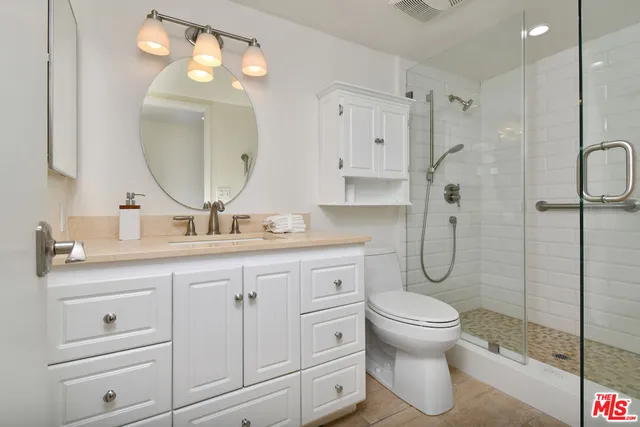 a view of a pool with a patio